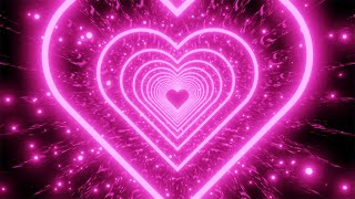 Neon Tunnel of Pink Hearts And Pink Particles on a Mirrored Background. 4K Video Loop