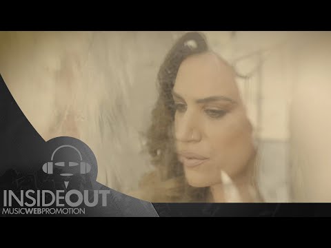 Τάνια Τσιούγκου - Σταγόνα - Tania Tsiougou - Stagona | Official Video Clip