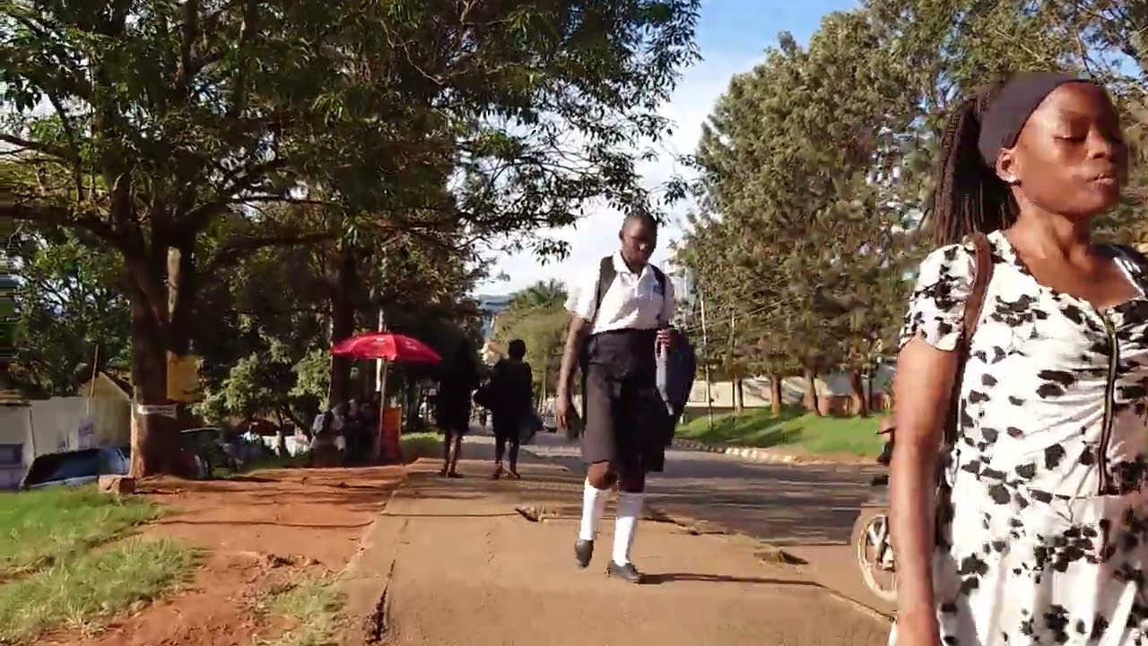 A silent walk through town. Only the street and the sites make noise. Uganda