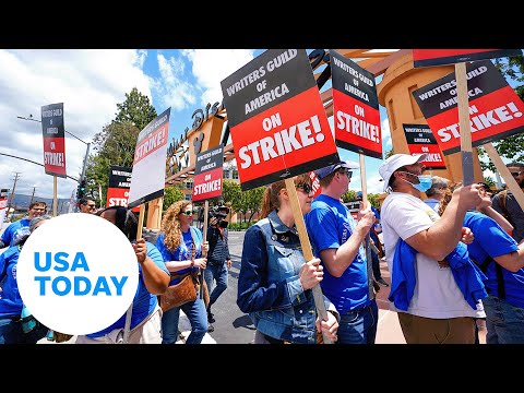 Striking movie and TV writers picket studios | USA TODAY