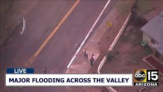 Vehicle stuck in flooded roadway in Phoenix Profile