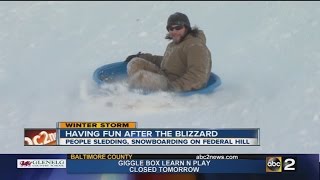 Federal Hill packed with people sledding