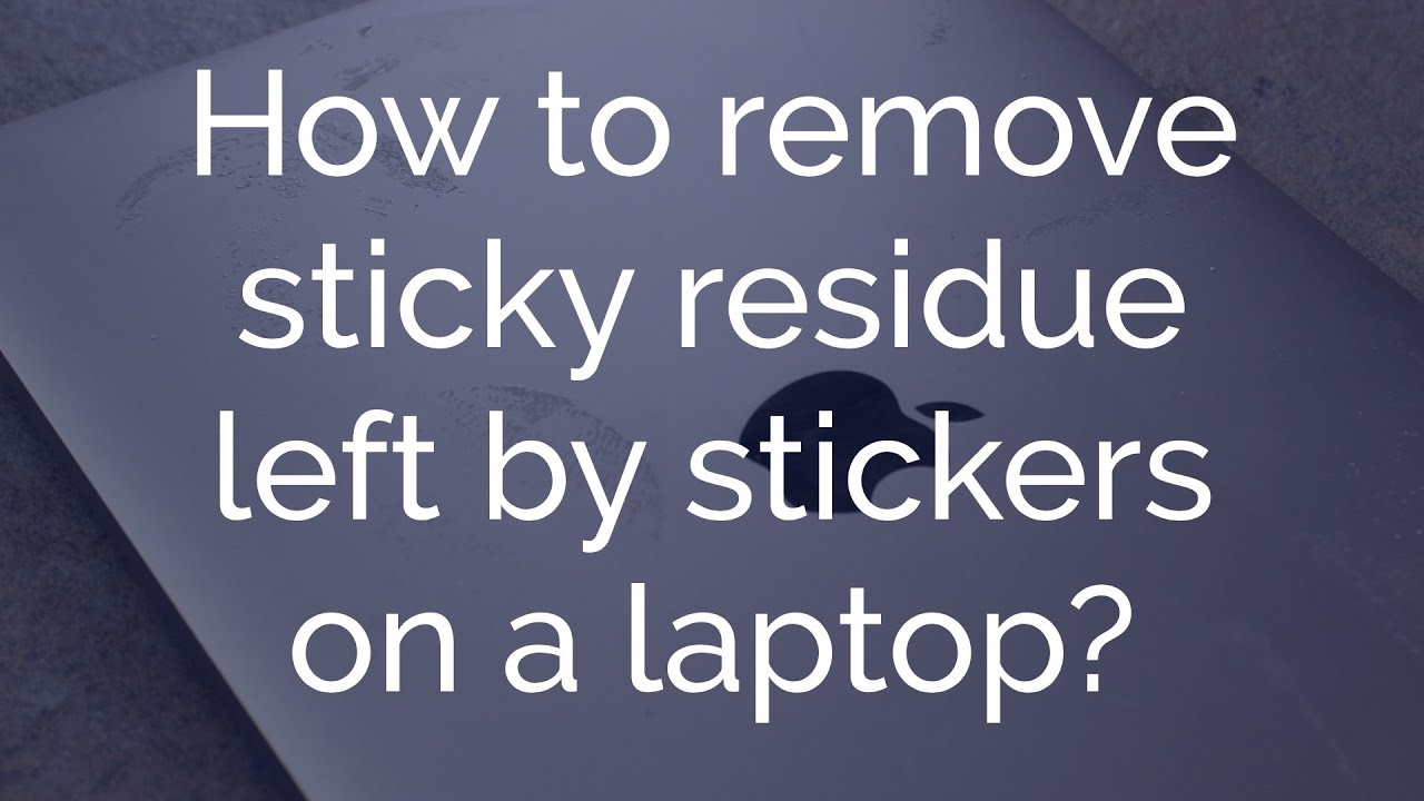 How to remove sticky residue left by stickers on a laptop? 