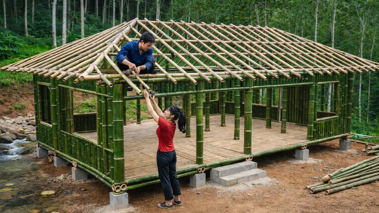 The young couple built their own bamboo house in the forest - building a new life.