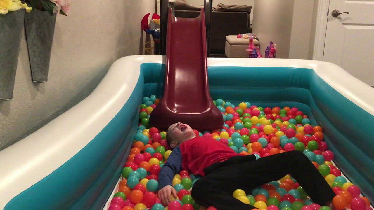 Basement ball pit fun ~ DIY ball pit using an inflatable pool!