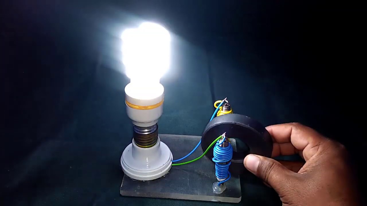 strand Telemacos Problem free energy generator with magnet & spark plugs use lights bulb - YouTube