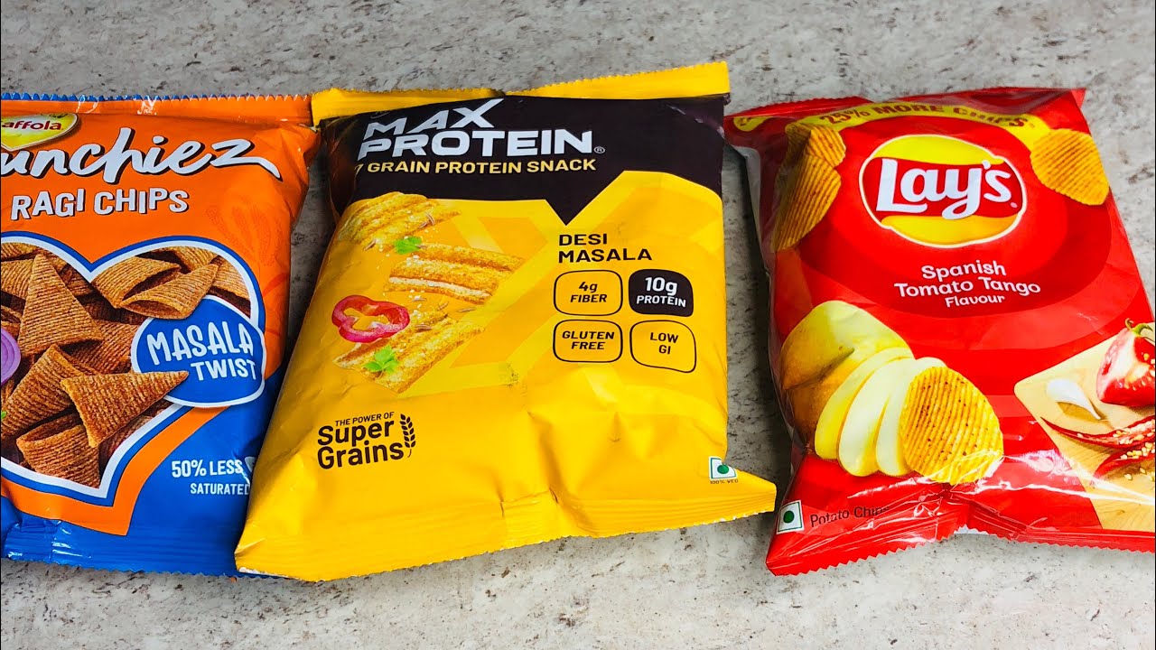 Lots of chips, protein bar, protein chips, lays, chocolates, candies