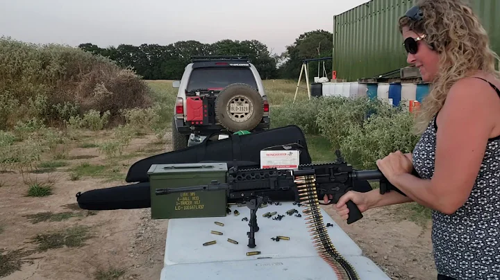 Jennifer Holcomb firing belt-fed Shrike M16