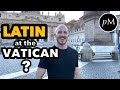 American speaks latin at the vatican with priests 