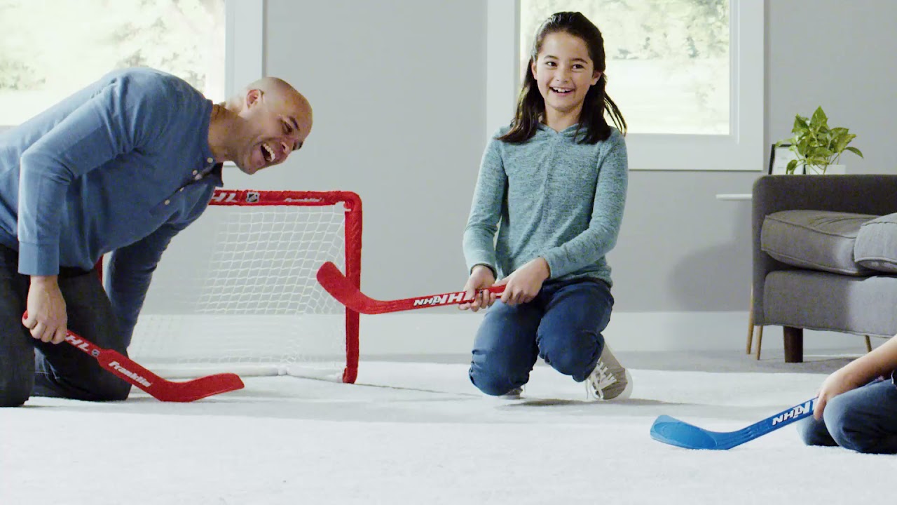 Franklin Sports NHL s Mini Hockey Set - Includes 1 Knee Hockey Goal - 2  Mini Hockey Sticks + 2 Foam Balls - Indoor Mini Hockey Goal + Sticks Set