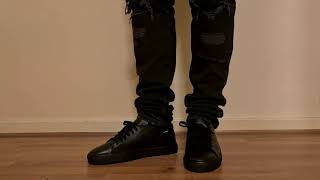 MENS AXEL ARIGATO TRIPLE BLACK CLEAN 90S TRAINERS ON FOOT