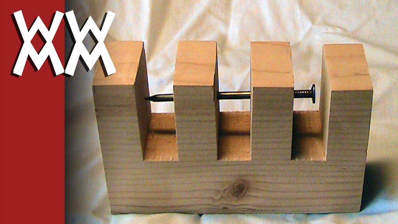 Impossible nail-through-wood trick. - YouTube