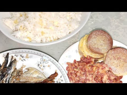 Our kind of Breakfast fried rice, dried fish,and corned beef loaf