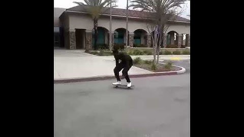 Andrew Boyde Nollie front side 360 shuvit up the curb