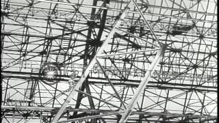 A hanger for USS Macon being constructed as men put together steel frame structur...HD Stock Footage