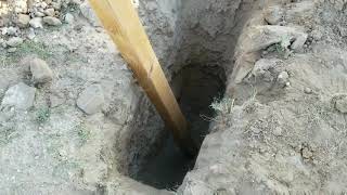 The last 2 post holes for the yard completed