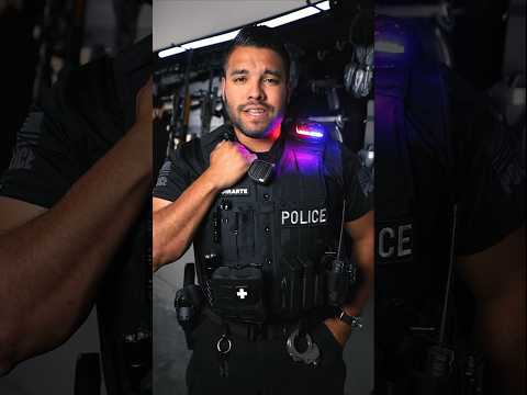 Police Officers Always Hold Their Vests Like This