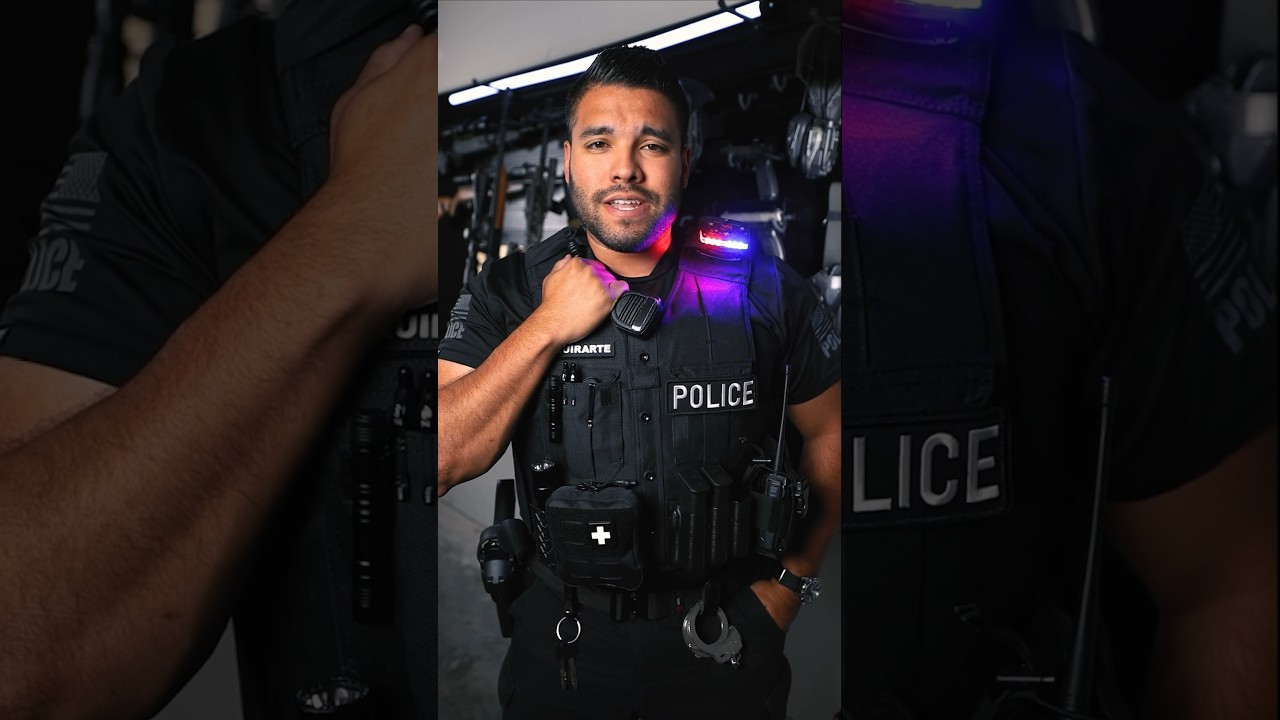 Police Officers Always Hold Their Vests Like This