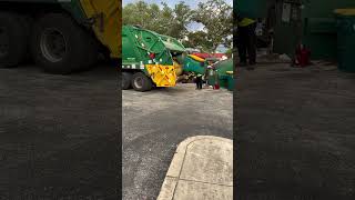 Wm Rearload Garbage Truck Picking Up Recycling