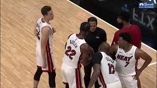 Coach Spoelstra and Udonis Haslem fight with Jimmy Butler.