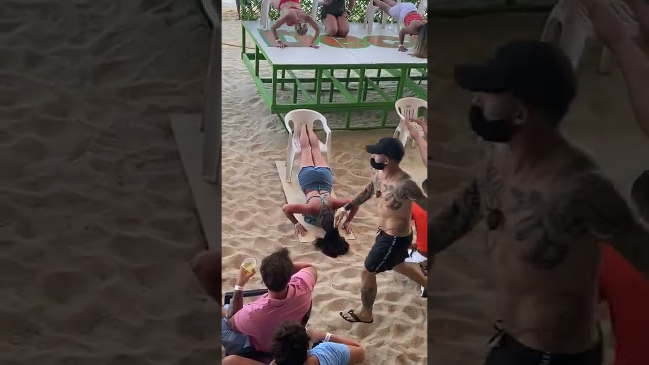 Best Beach Bar in Cabo Mango Deck Cabo Girl in Bikini Doing Push ups Fun Party Bar Restaurant Cabo