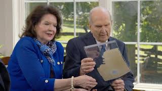 Youth Hold Original Manuscript from Book of Mormon (Russell M. Nelson)