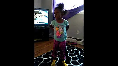 Karrie listening to caillou
