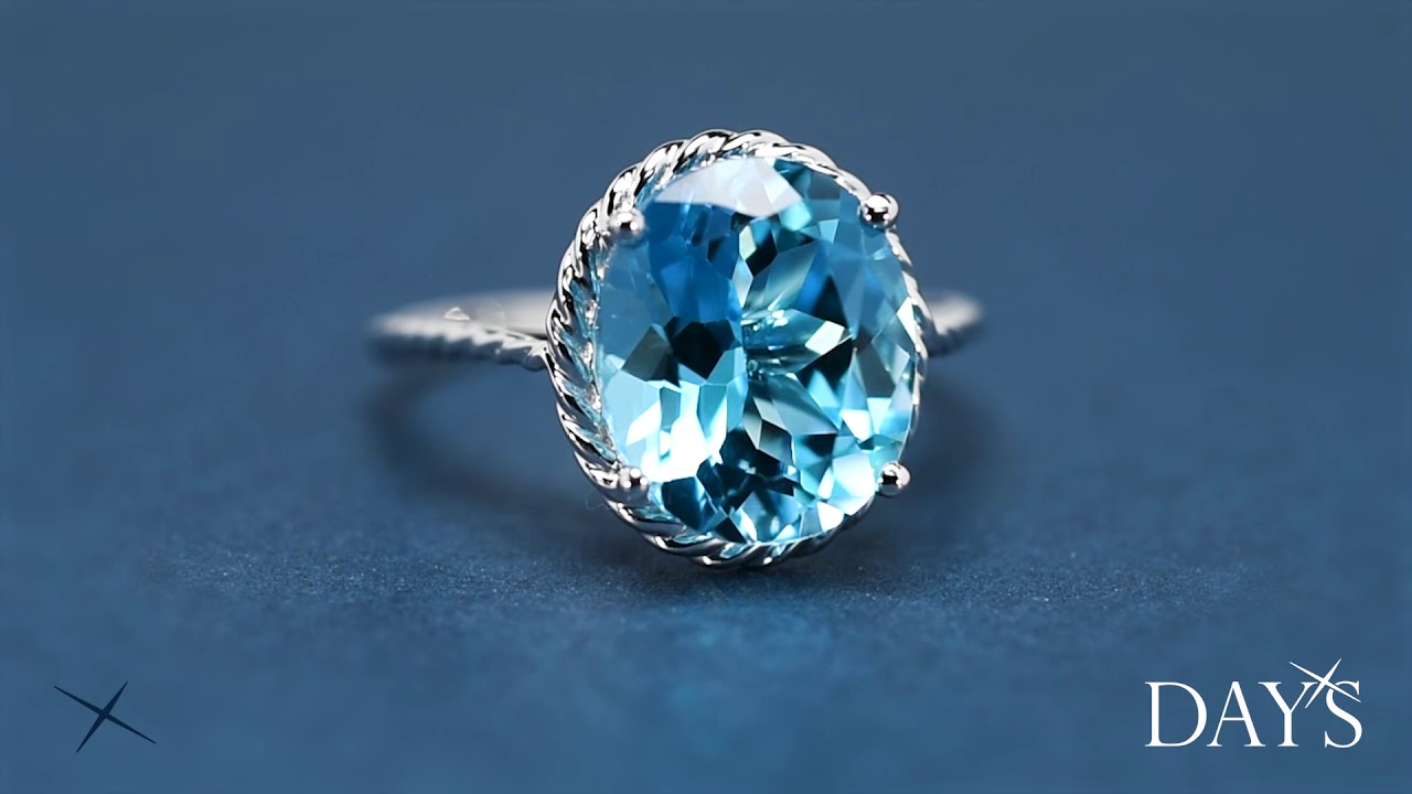 Oval Blue Topaz Ring in 14kt White Gold