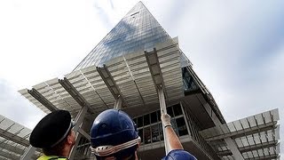 Greenpeace Activists Scale Londons Shard Skyscraper