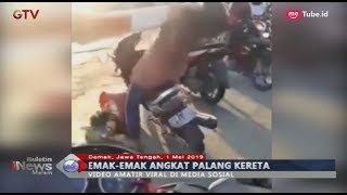 Viral Video Emak-emak Angkat Palang Pintu Perlintasan Kereta hingga Terjungkal - BIM 01/05
