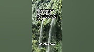 The planet Mars has a reddish appearance due to iron oxide (rust) on its surface.