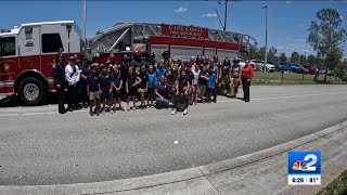 Female firefighters visit third grader who was teased for wanting to do their job