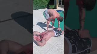 Hot muscle guy getting oil massage by another sexy guy