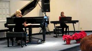 Bri and Savi piano duet 20081214 215.avi
