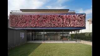 Unique Facade of a Textile Exporters Office_Knitted Eaves