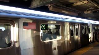 R188 (7) local train with LED lighting departing 46 street Bliss Street