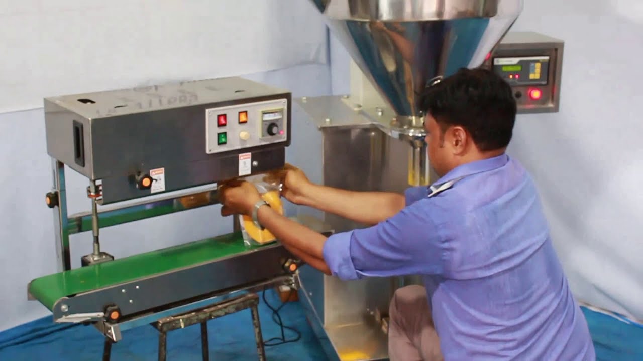 Semi Automatic Auger filler machine - YouTube