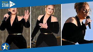 Adele stuns as she bares shoulders in low-cut black velvet gown at Hyde Park concert