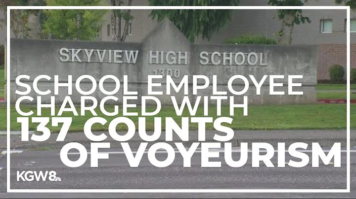 School employee charged with 137 counts of voyeuri...