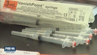 FDA approval of Pfizer vaccine sets up path for more companies to require the shot