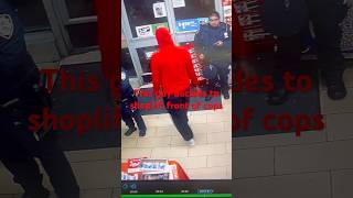 two cops watch the surveillance cams, this guy is aware of it but still shoplifts