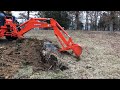 Digging dirt  Stump removal process #1 with BH92