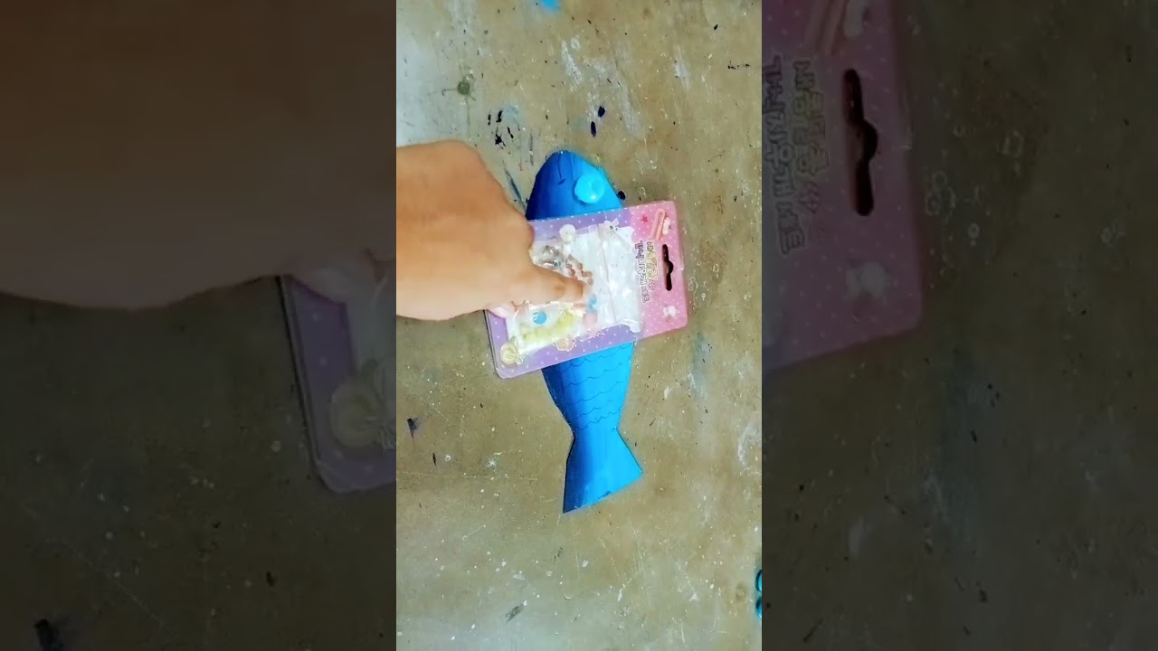 Wall hanging of fish . With blue wool 