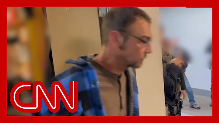 Video shows arrest of school shooting suspect's pa...