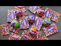 Gems opening surprise toys chocolate opening lots of chocolatescadbury celebration