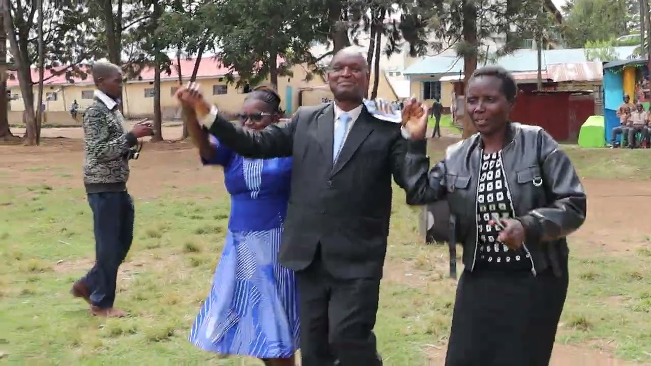 ST. ANDREW KAGGWA BOYS TEACHERS AND PARENTS CELEBRATE THEIR PRINCIPAL MR. NYAMWEYA.