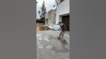 Water just drains completely through in seconds on this permeable pavement driveway