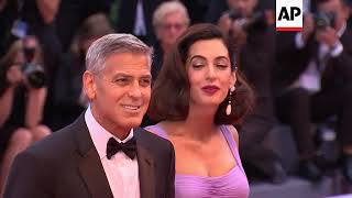 Amal looks lovely in lilac in Venice
