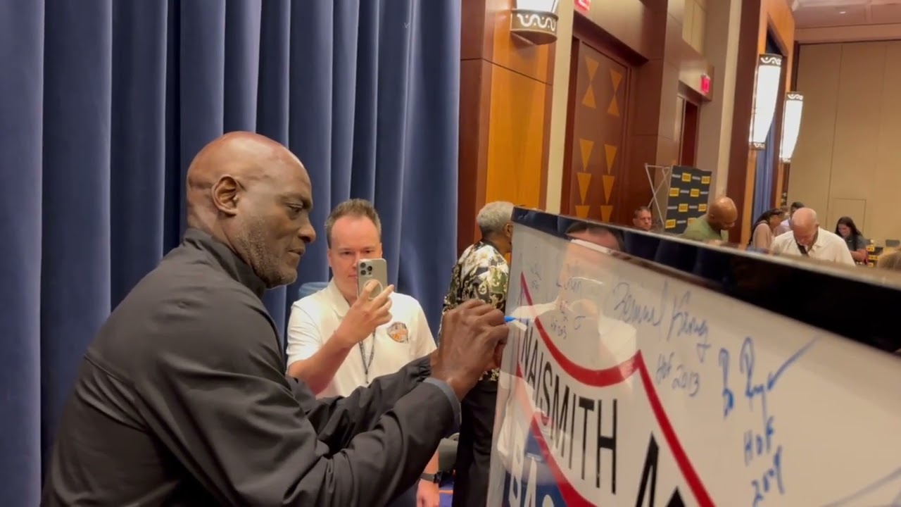 Los Angeles Laker and Hall of Fame Great Michael Cooper signs the Original Basketball HOF Sign
