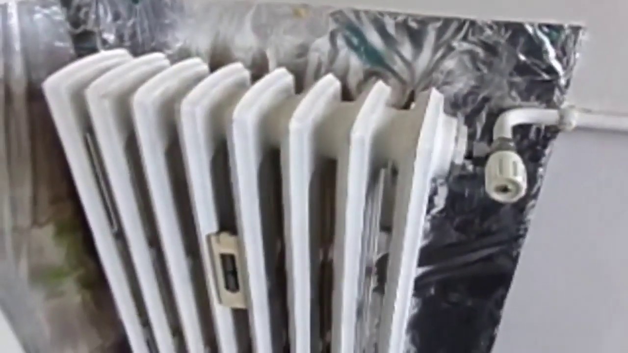 Placer du film réflecteur pour radiateur — gardez la chaleur à l
